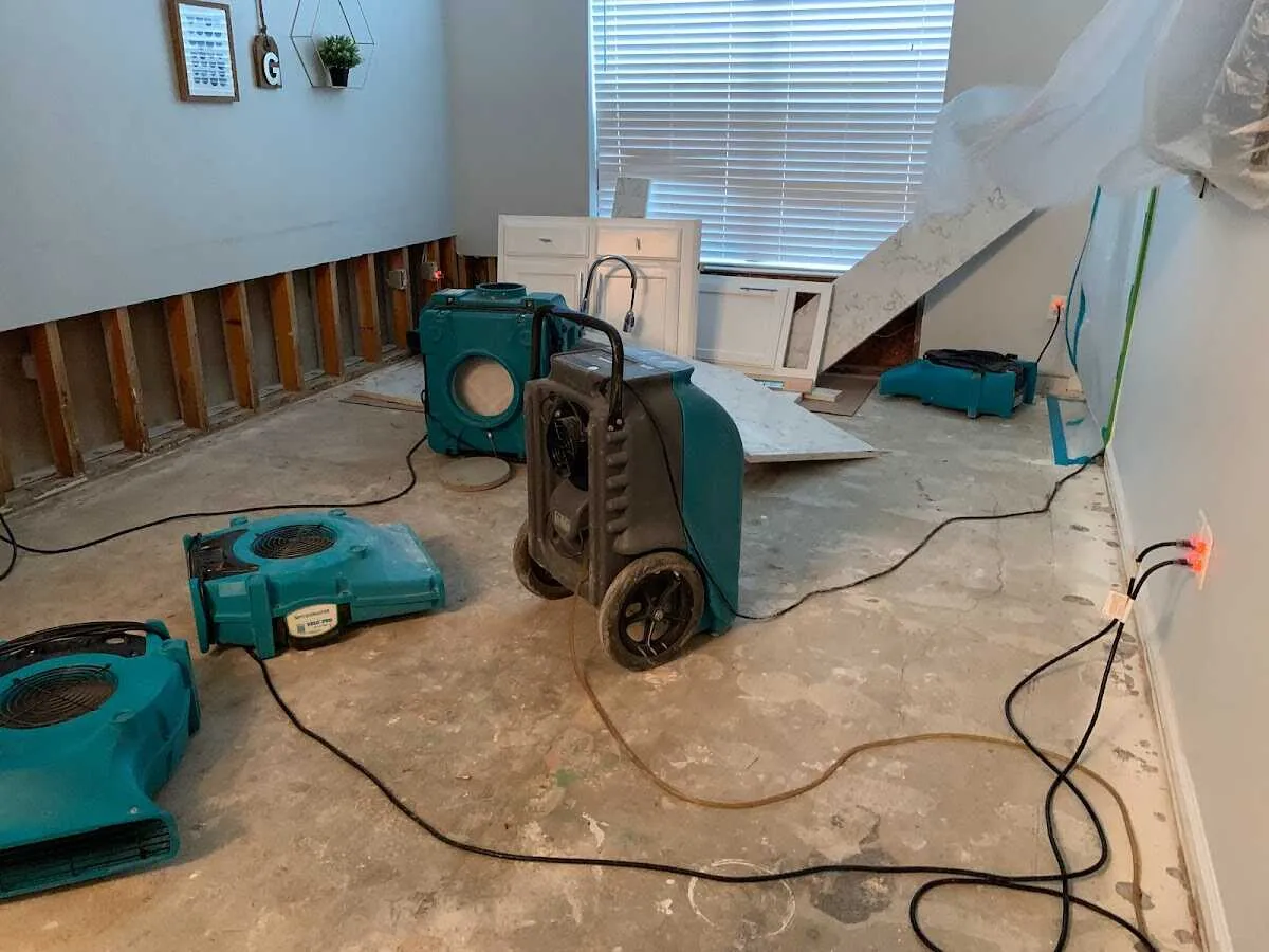 Dehumidifier in flood-cut room for Water Damage Restoration in St. Louis Park